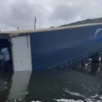 Incautado un tráiler semisumergido en el río Miño con una posible narcolancha oculta en su interior